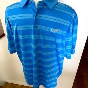 Under Armour heat gear polo with Quintero Country Club embroidery